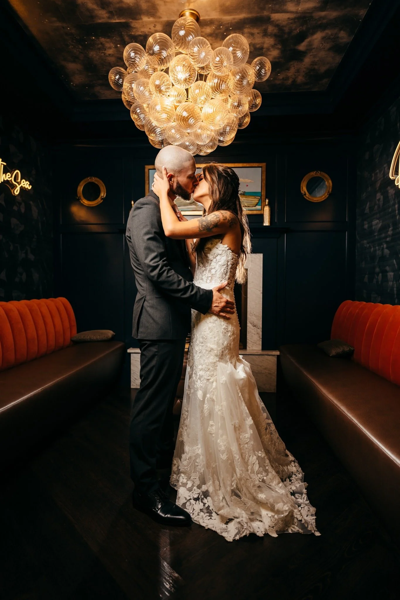 Kiss under chandelier seaside