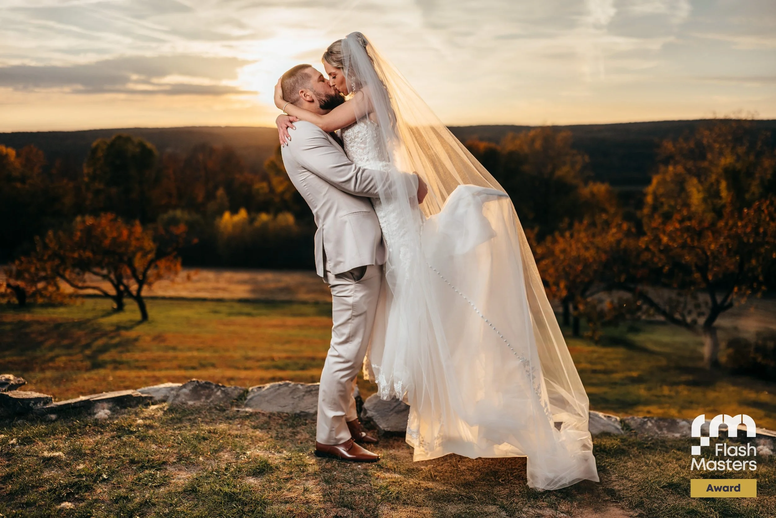 A sunset kiss in an autumn field