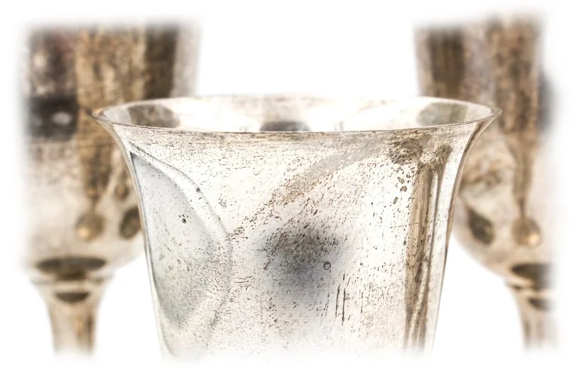 Tarnished silver cups before evaluation at The Gold ATM
