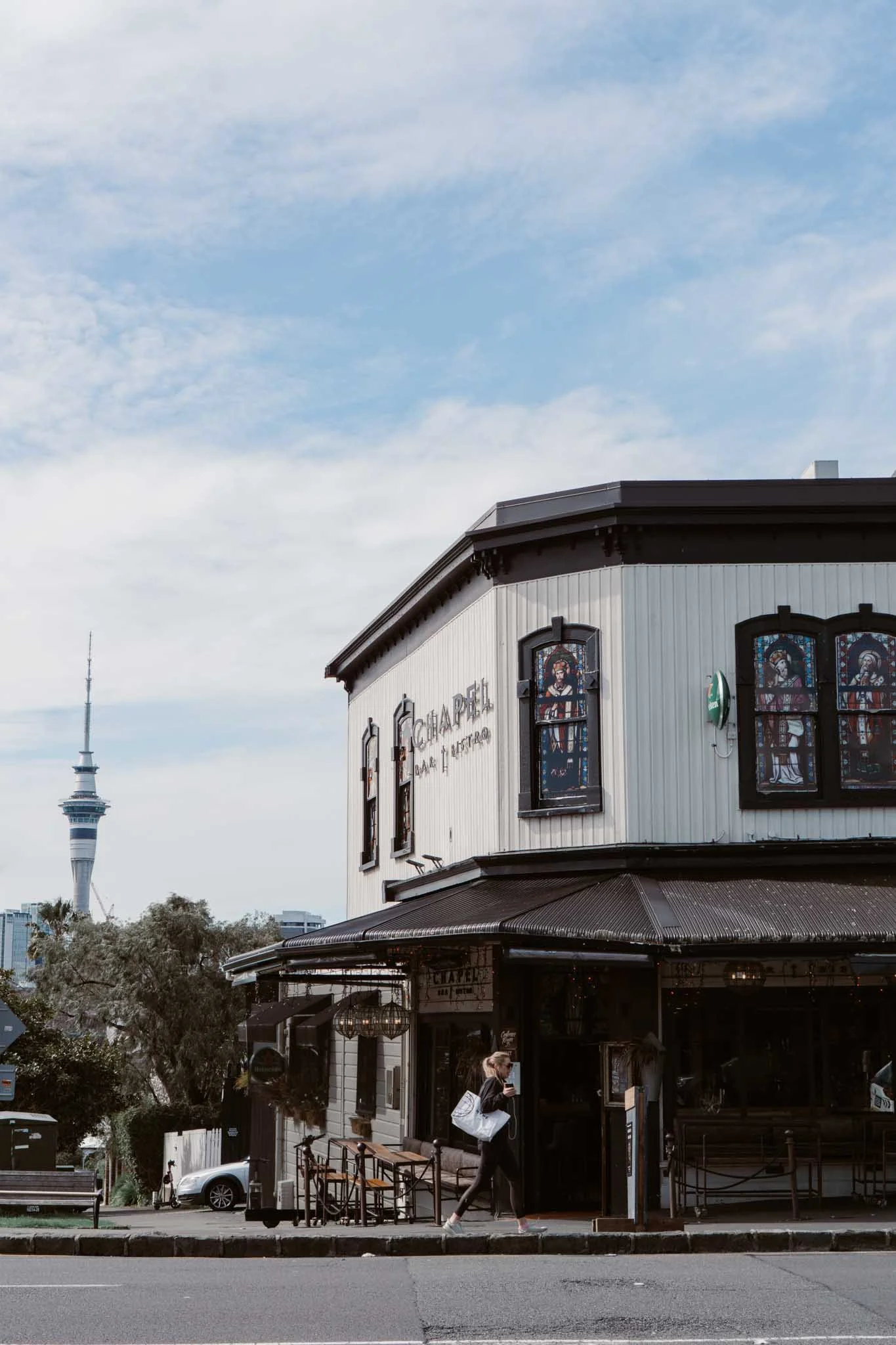 A view of the sky tower from Ponsonby Road in Auckland