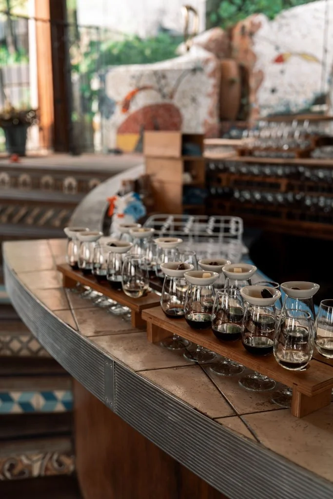 At Casita Miro small wine glasses sit lined up in a row
