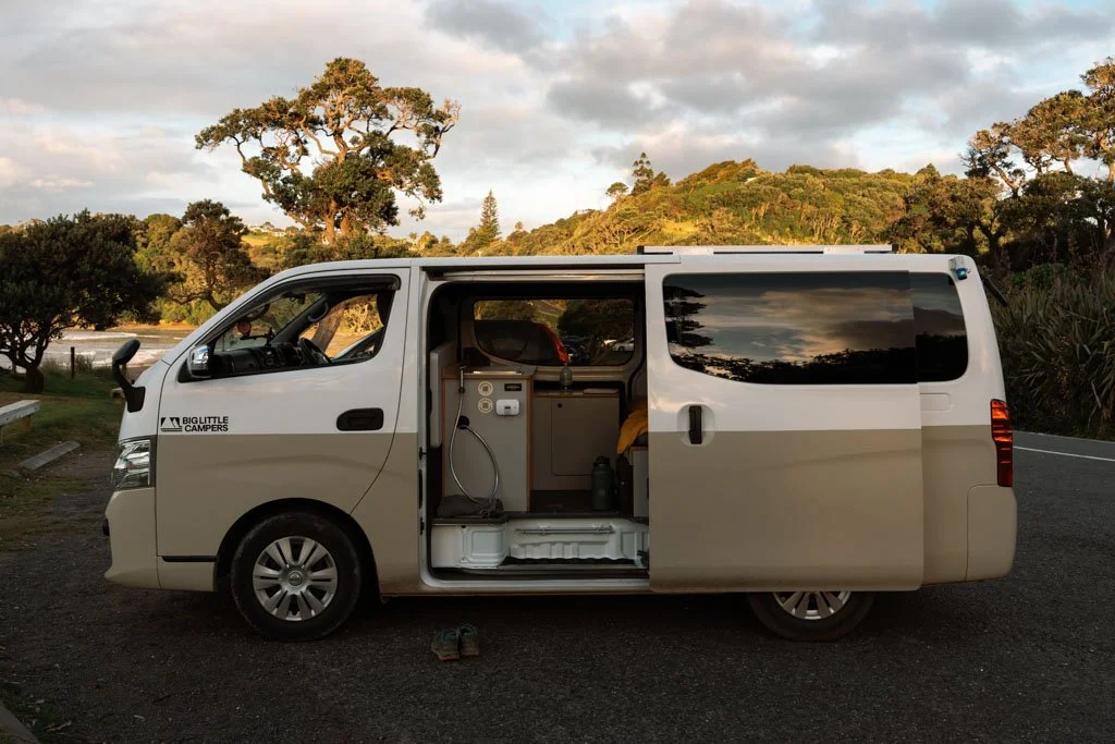 Big Little Campers van parked by the beach