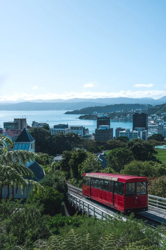 Wellington's red cable car climbing the hill above the city