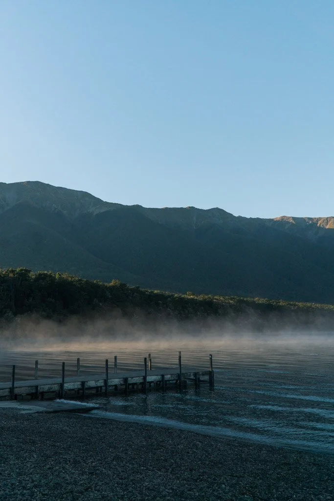 Morning mist rises off Lake Rotoiti in Nelson Lakes National Park