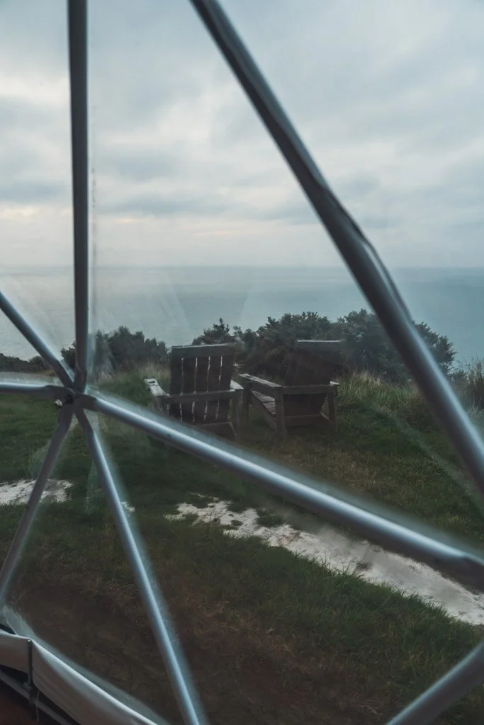 Chairs sit overlooking the coast near Wellington