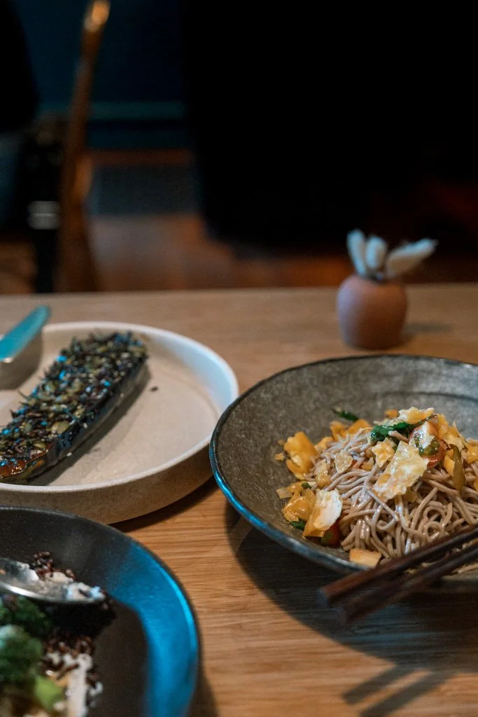 Plates of food on the table at Koji, Wellington