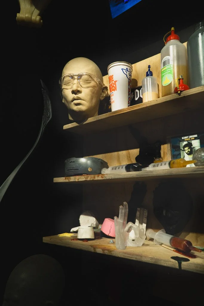 Props, tape and glue. ona shelf at Weta Workshop