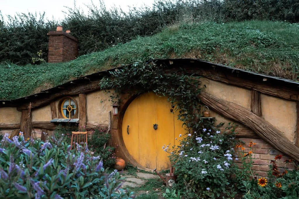 A yellow hobbit door at Hobbiton