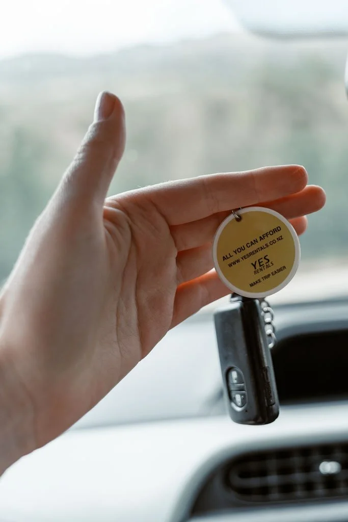 A key fob reads “All you can afford”, Yes Rentals