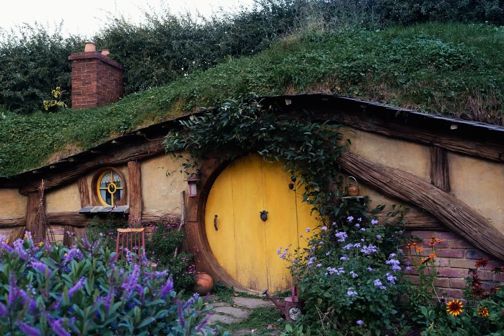 A round yellow door at Hobbiton in New Zealand