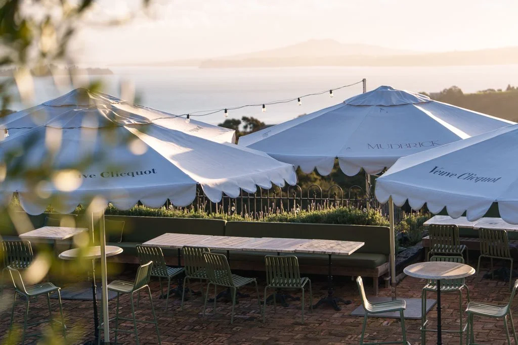 Tables and chairs on the rooftop terrace at Mudbrick