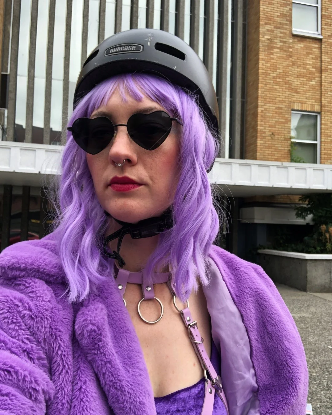 Just a girl dressed in purple ready to safely ride her bike🪖