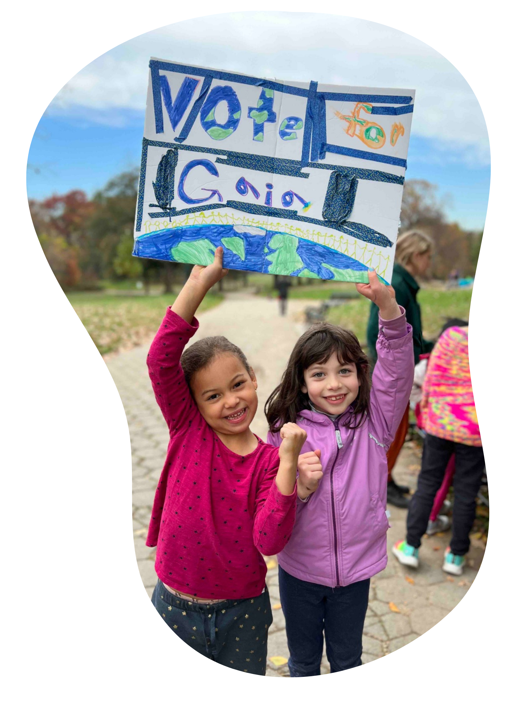 Two girls with a sign that says Vote for Gaia - Prospect Park