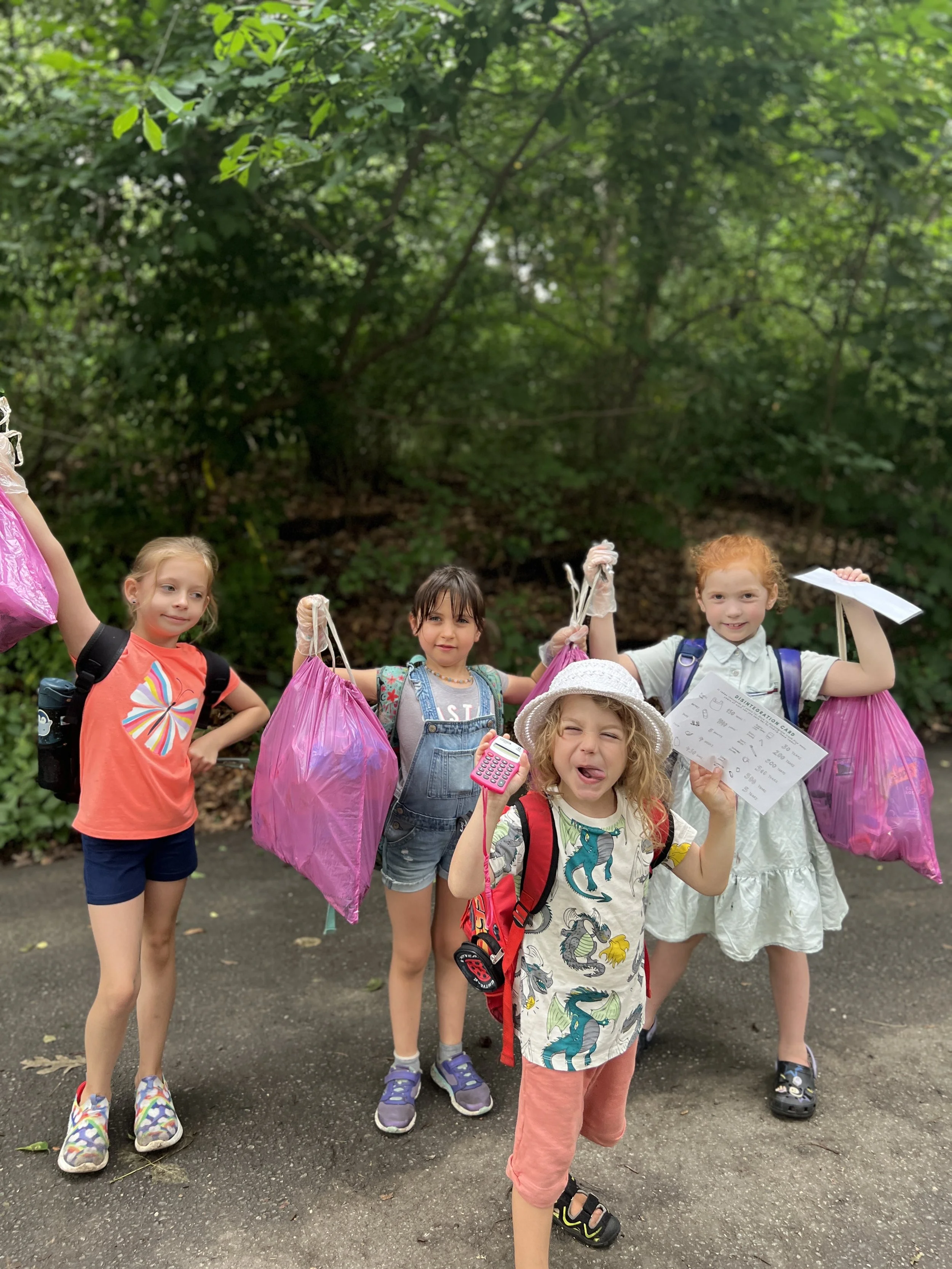 Wonder Kids proudly show all the trash they have collected in Prospect Park