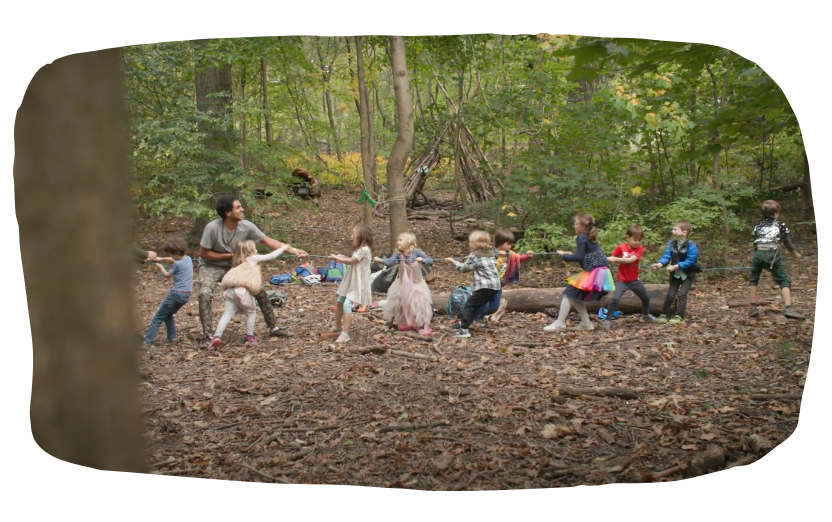 Happy kids playing with rope in Wonder Village at Prospect Park