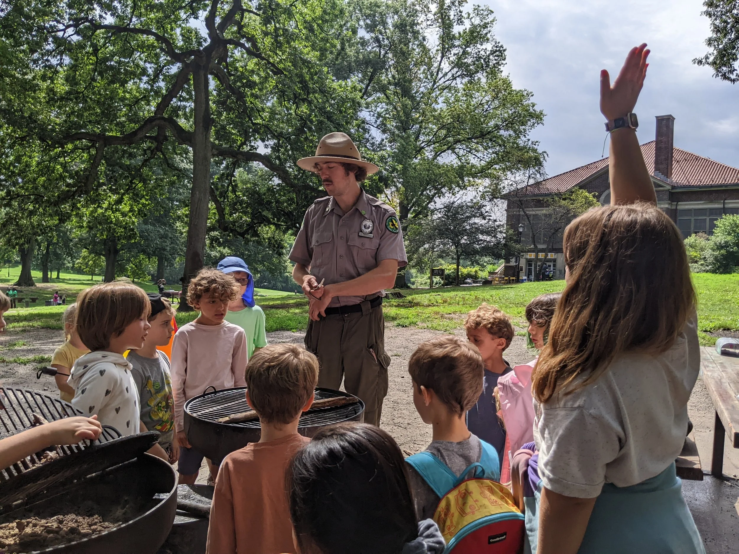 Ranger Chris teaches the Wonder Kids how to make fire in Prospect Park