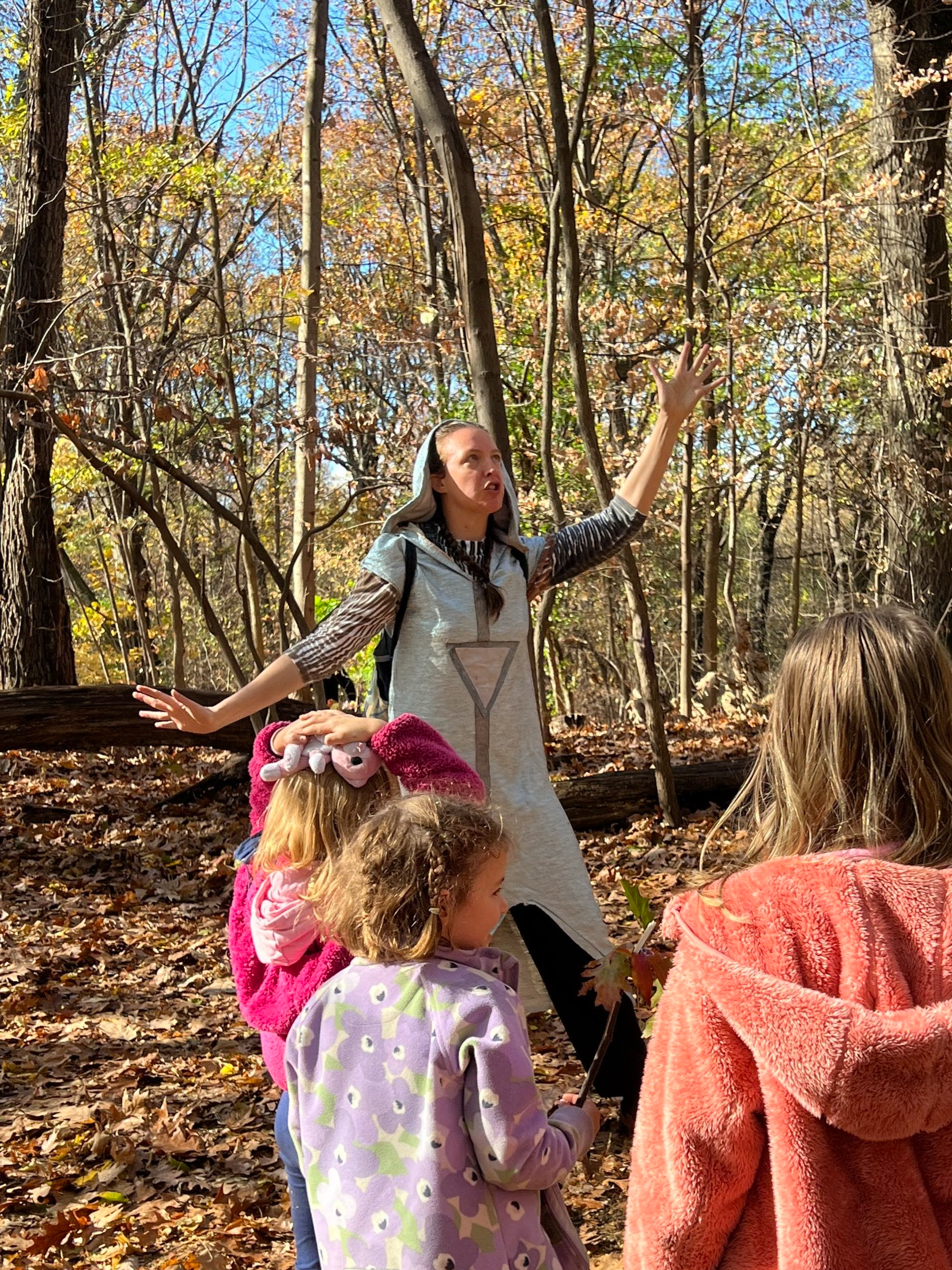 Wonder leader guiding immersive play in nature