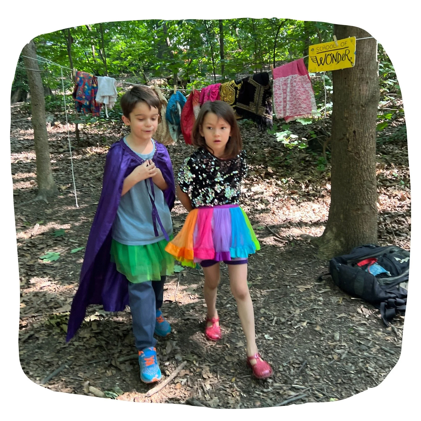Kids in grades K–2 playing in costume during a Wonderers after school