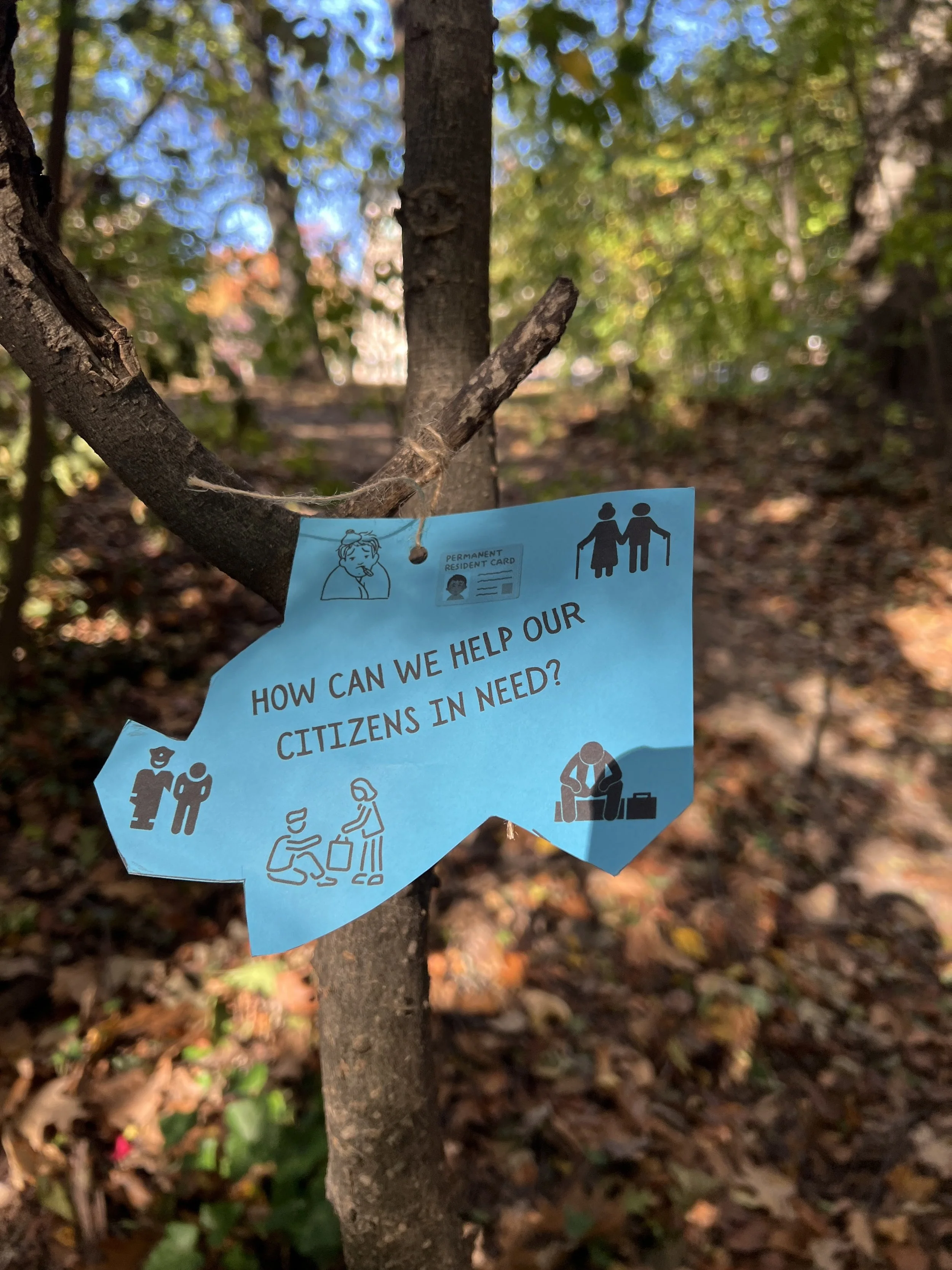 School of Wonder puzzle piece hidden for summer camp scavenger hunt in Prospect Park