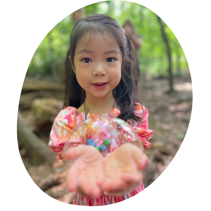 Girl shows a bubble in her hands