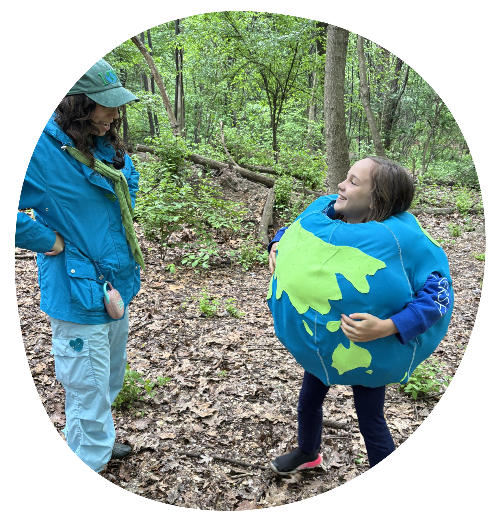 Wonder Kid wearing earth costume talks to a Wonder leader