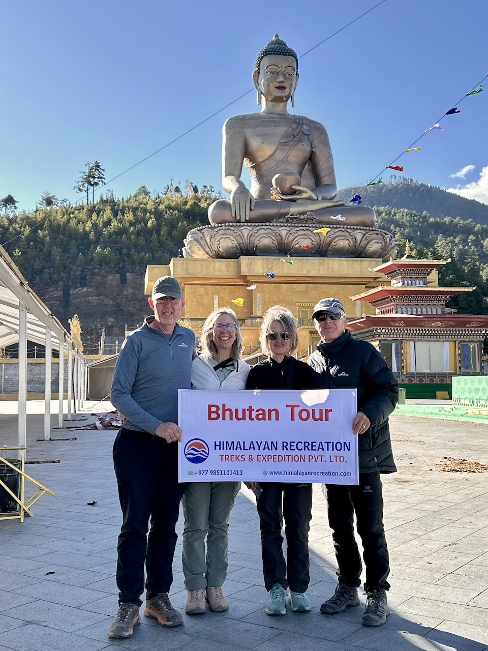 Giant bronze and gold Buddha statue overlooking Thimphu, Bhutan