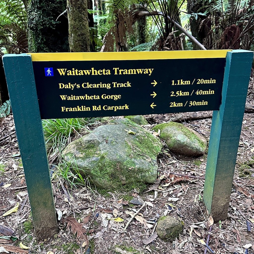 DOC track sign in Kaimai Forest