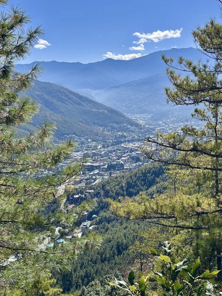Bhutan travel landscape with rolling green hills, rivers and remote villages