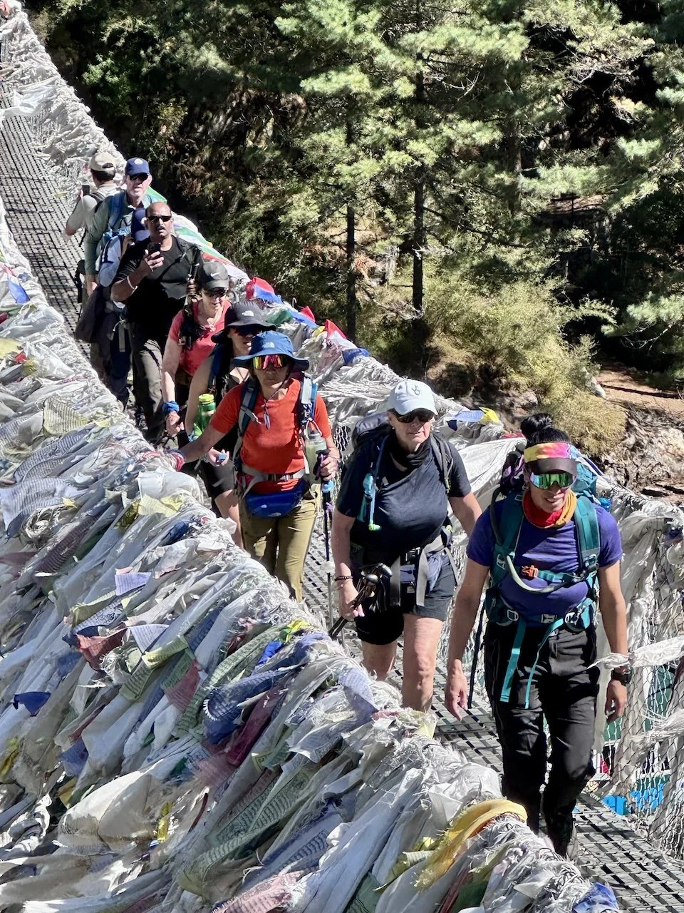 Everest Base Camp trekkers crossing the Hillary Bridge