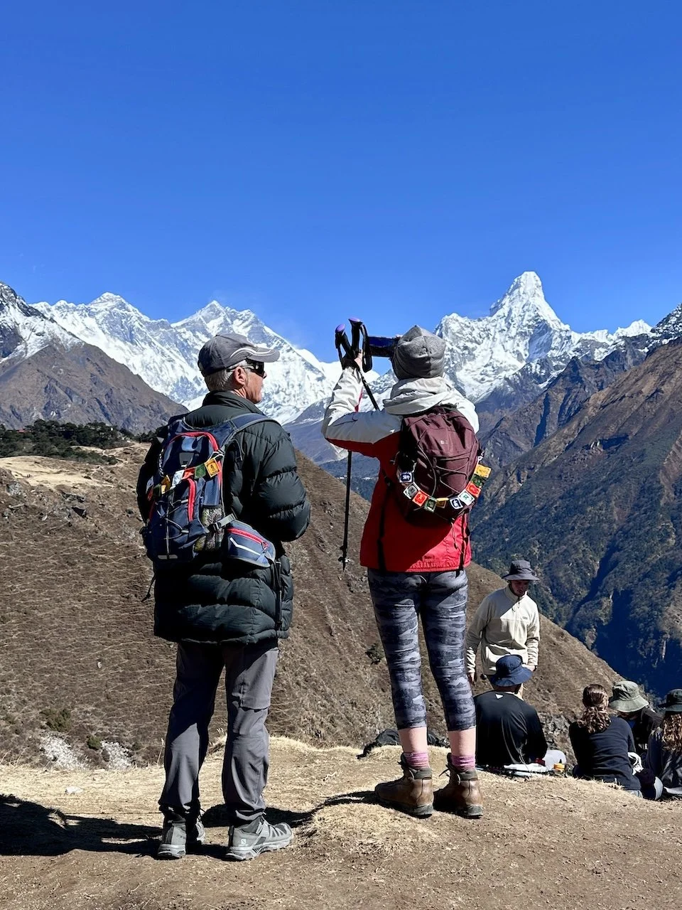 Everest Base Camp trekkers photographing Mt Everest and Mt Ama Dablam