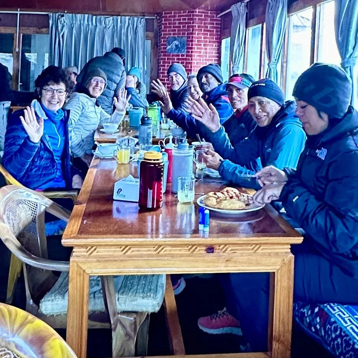 Happy trekkers having breakfast. Lobuche Tea House, Everest Base Camp Trek