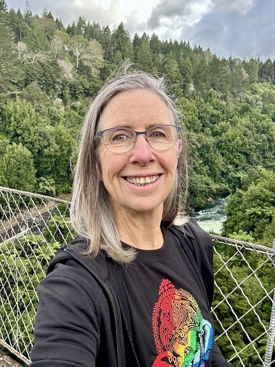 Smiling hiker on Arapuni Swingbrige
