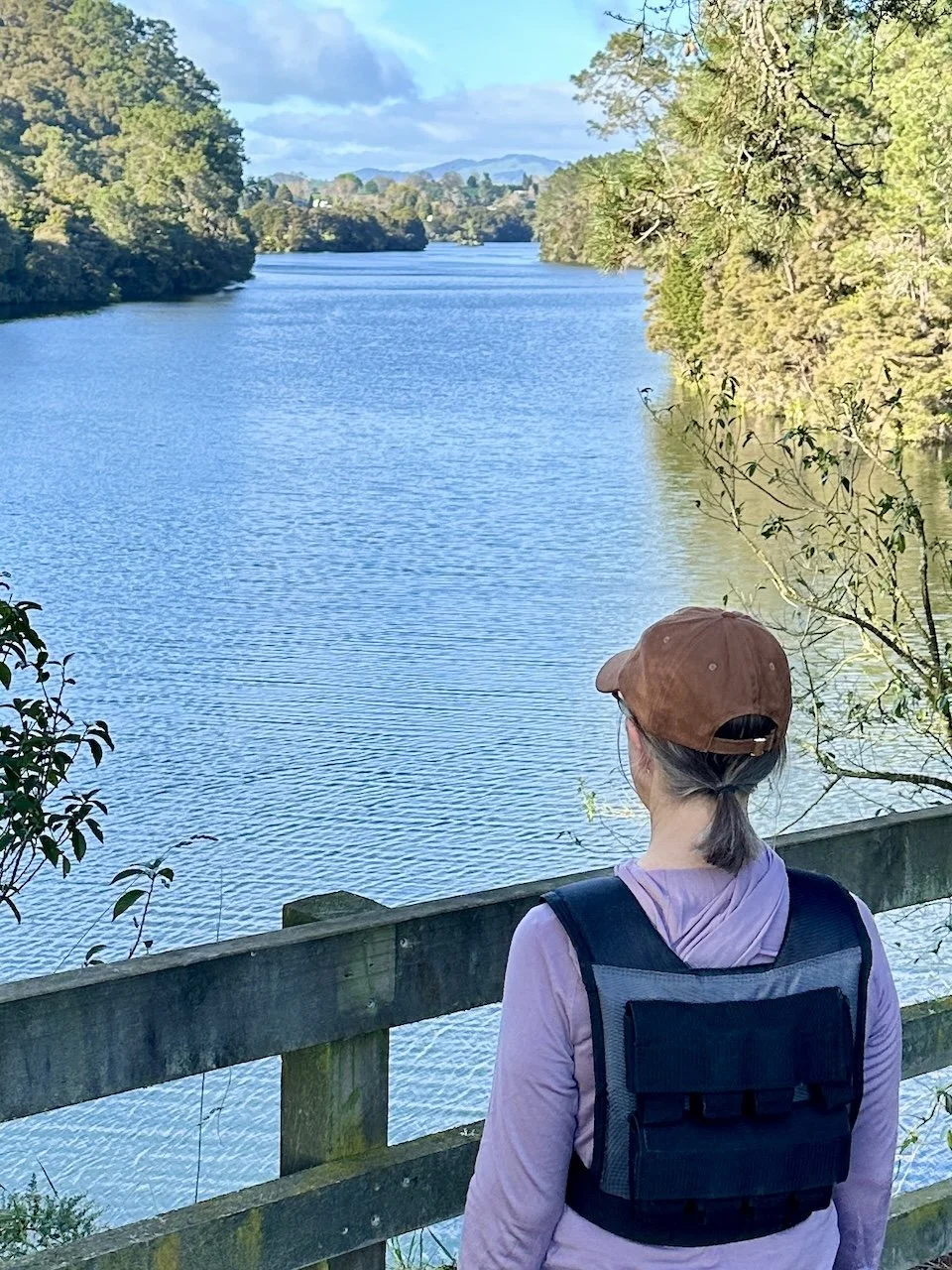 Sharon pausing to enjoy the Waikato River from the trail