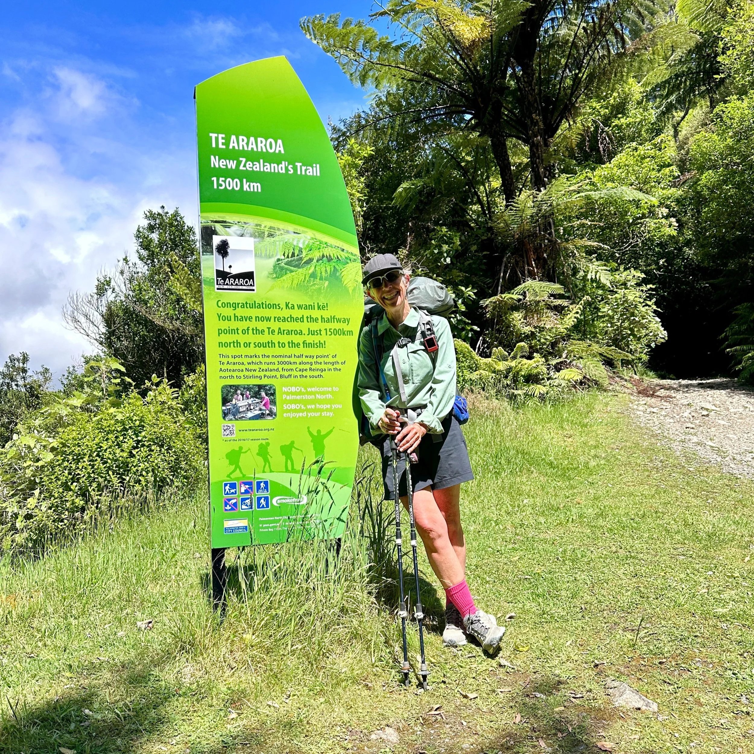 Sharon Evans at the Te Araroa 1500km signboard. Half Way