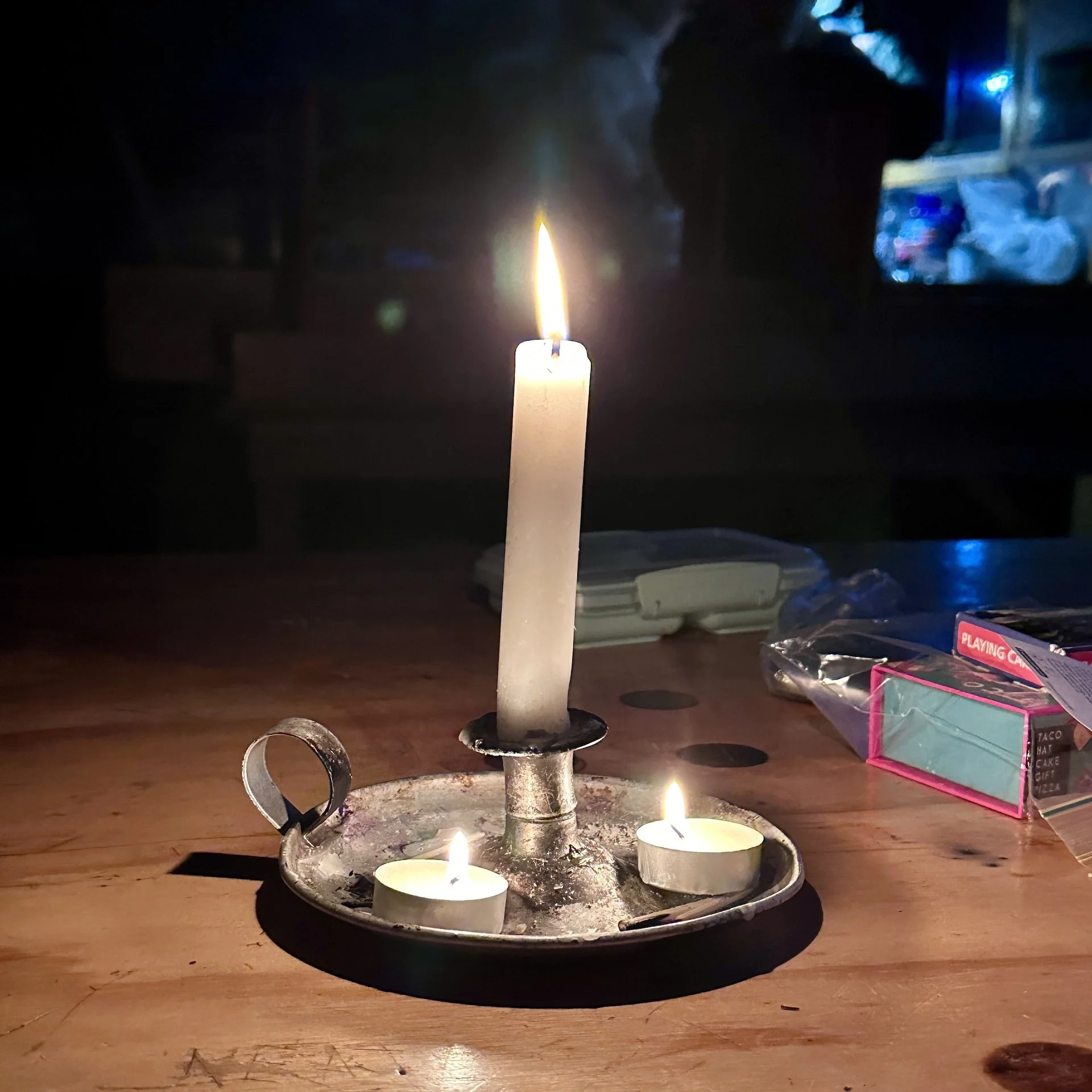 Candle burning merrily at the Waitawheta Hut, Kaimai Forest Park, New Zealand