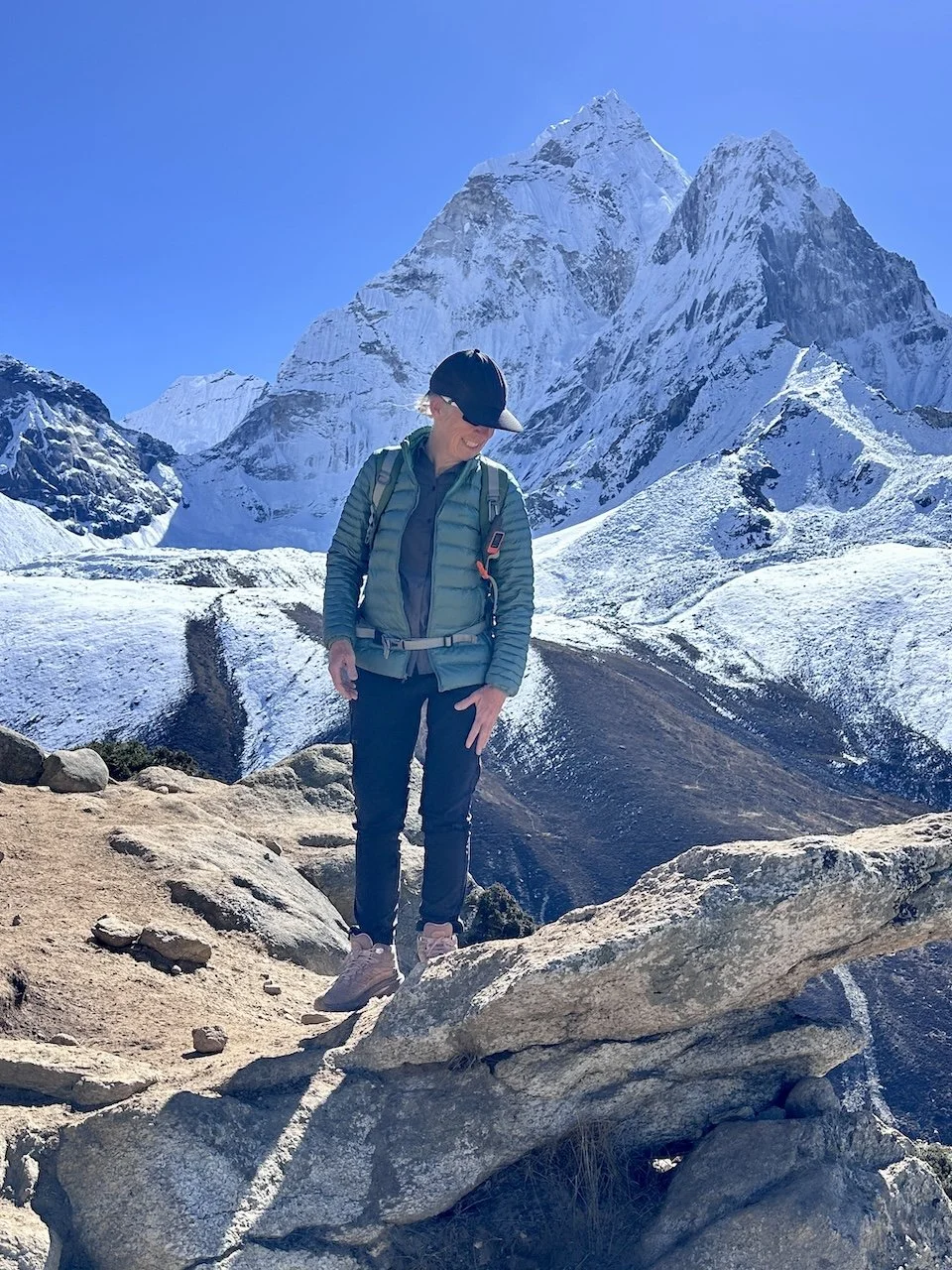 Sharon Evans standing in front of Ama Dablam, Everest Base Camp Trek, Nepal. Wearing Merrell NZ trail shoes
