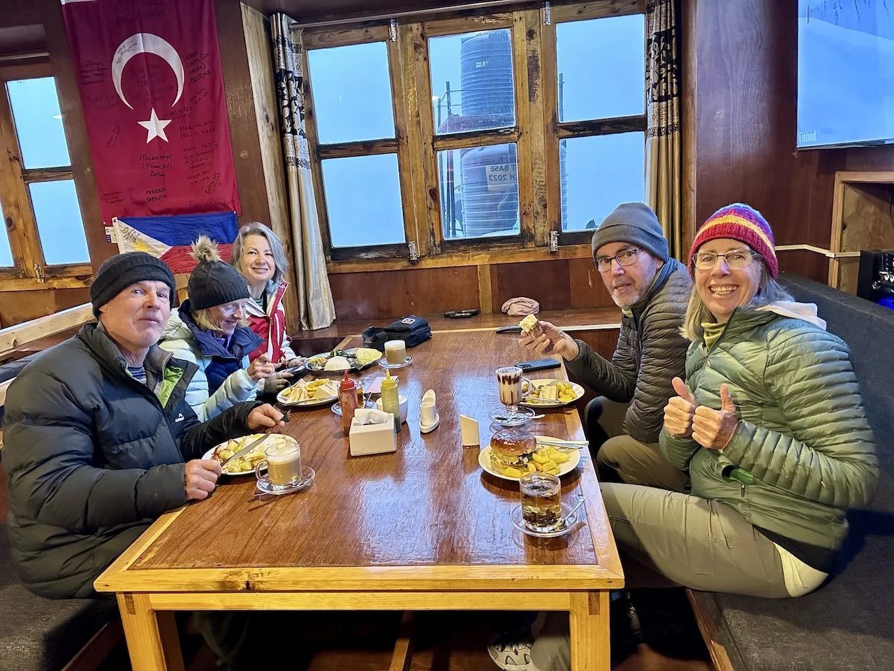 Smiling trekkers at Tea House in Namche Bazaar, Everest Base Camp trek