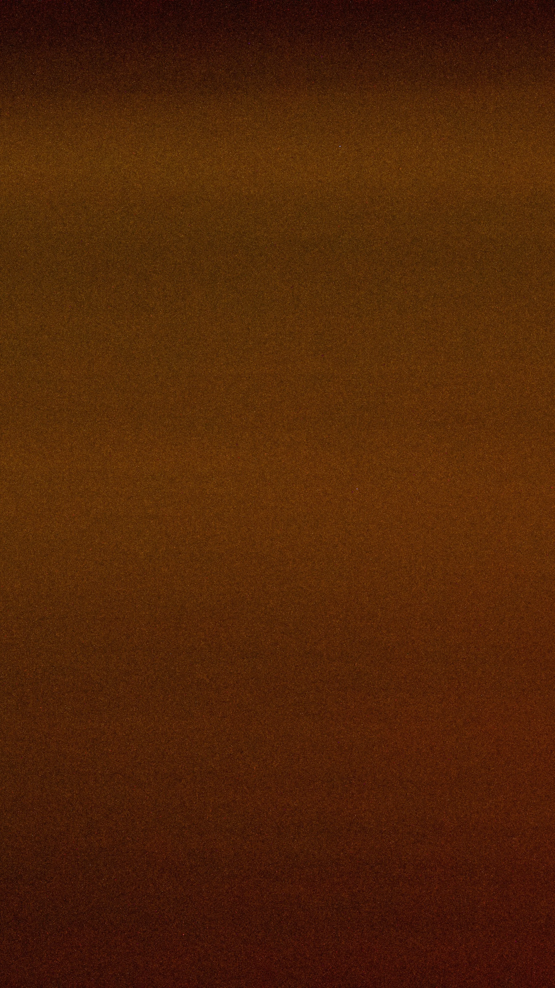A plain, textured brown surface with no distinct objects or features.
