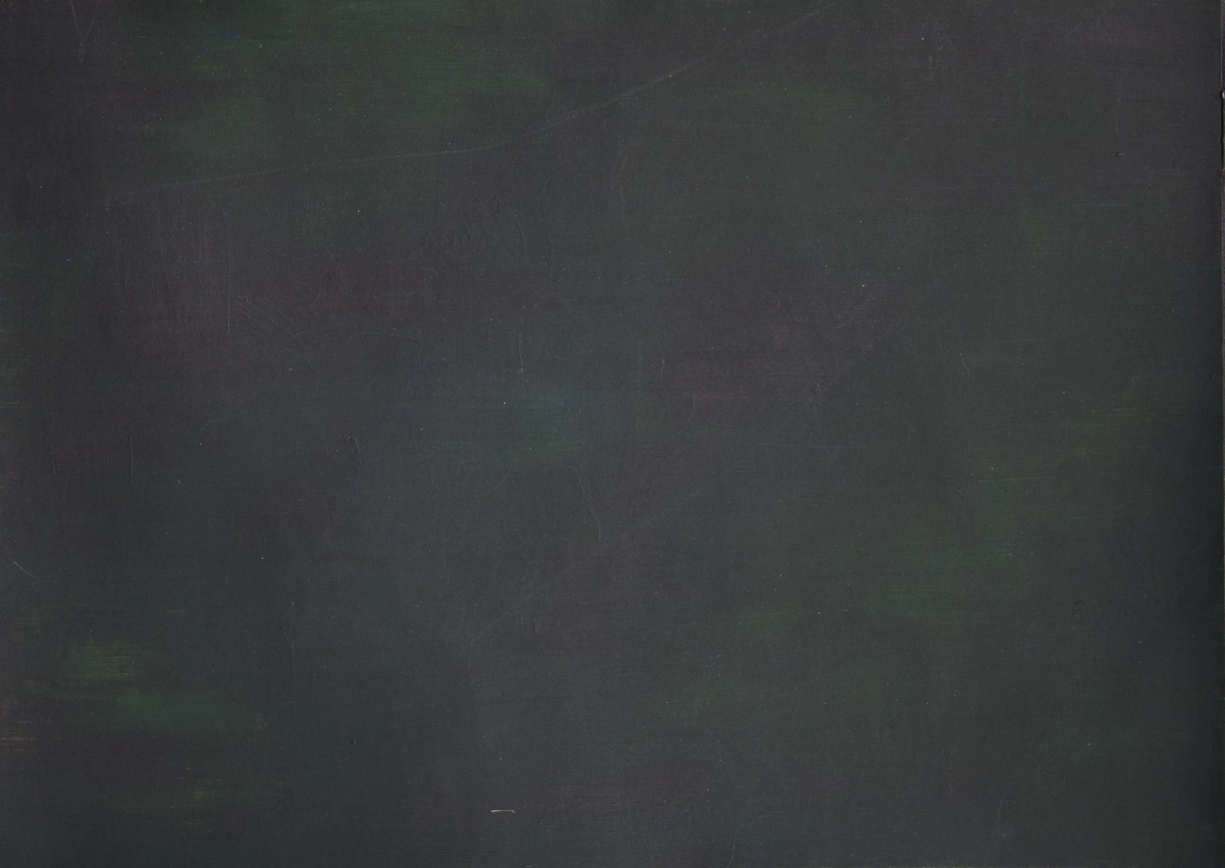 Dark surface with faint hints of green and blue colors, no distinct objects visible.