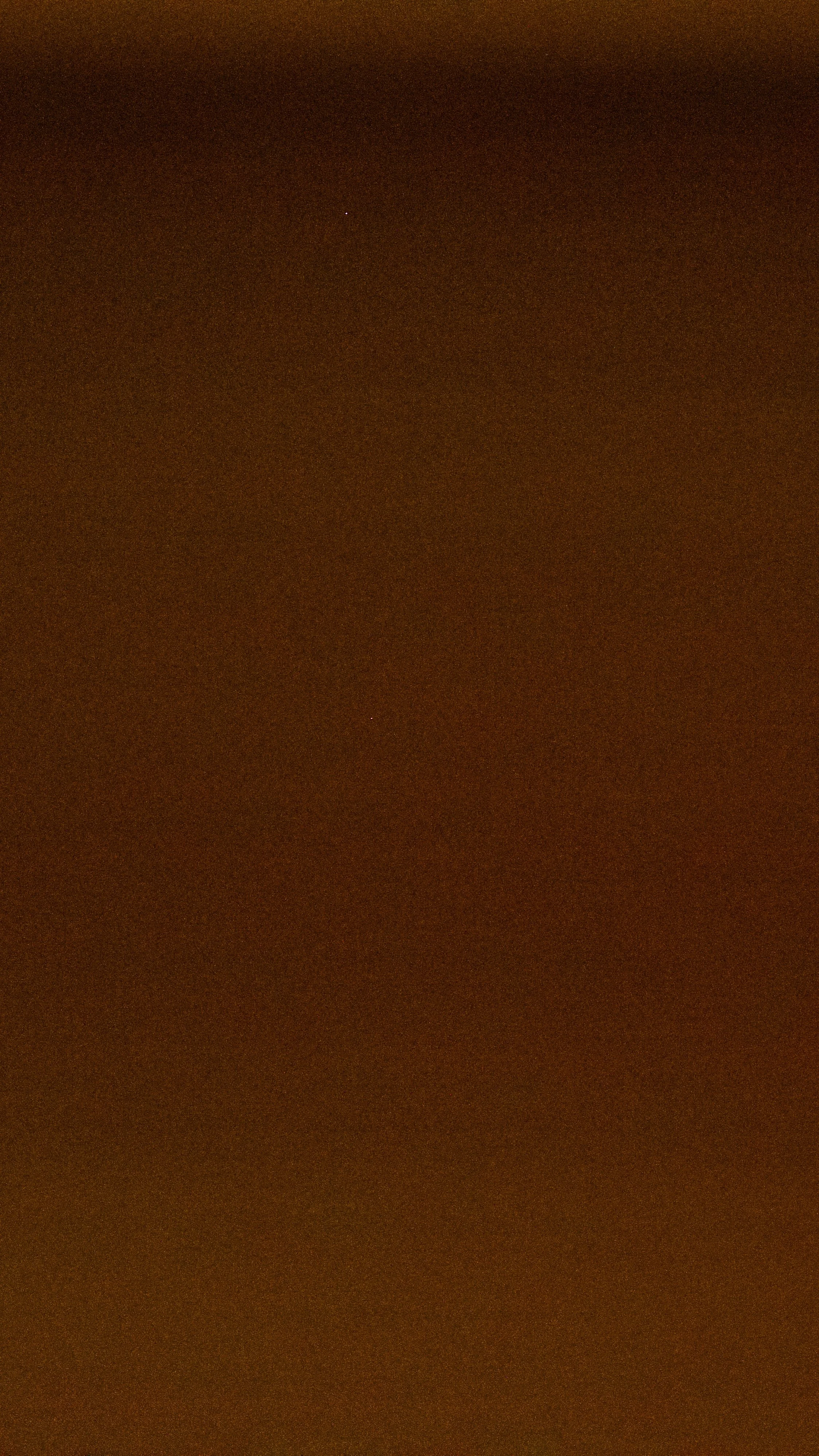 The image is very blurred and dark, making it difficult to identify specific objects or scene details.