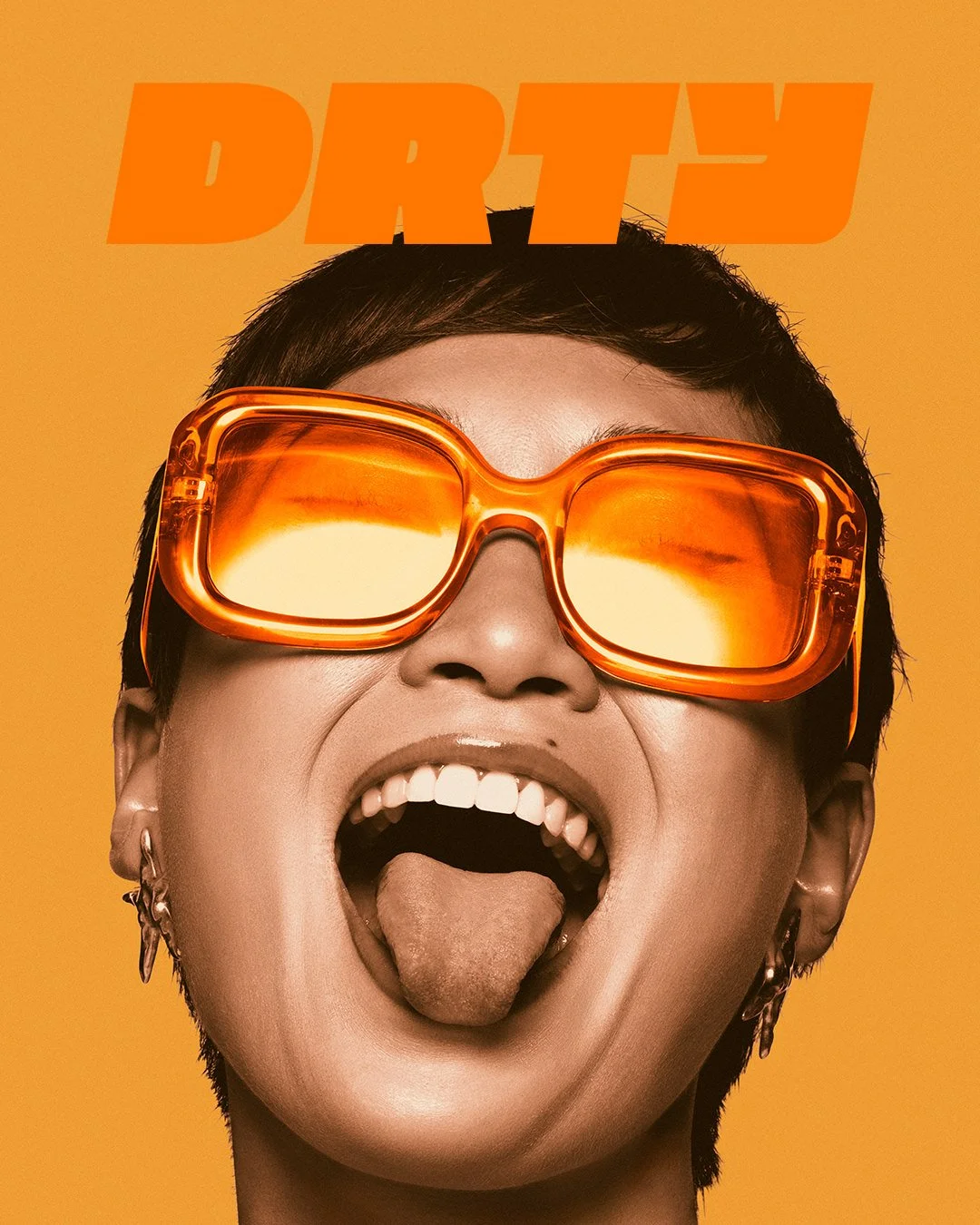 Person wearing large orange sunglasses with their mouth open and tongue sticking out against an orange background DRTY Drinks Campaign Photography