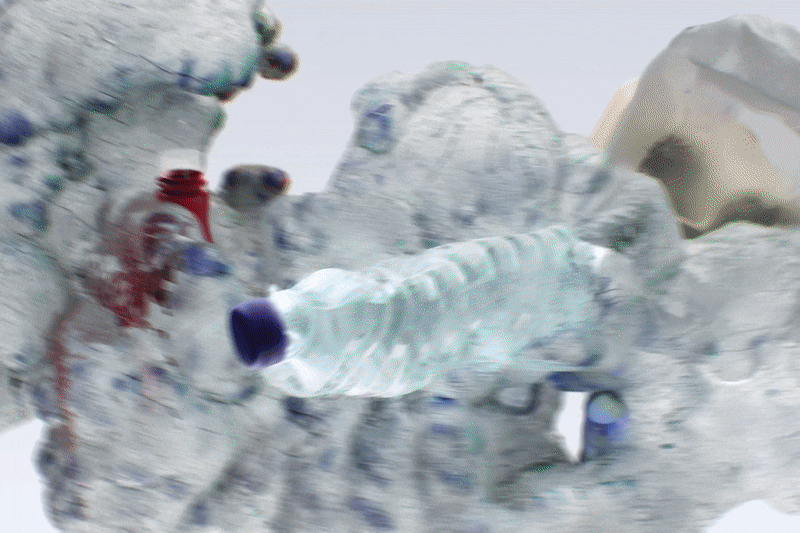 Conceptual soccer cleat design made from recycled plastic waste and a blue digital wireframe mesh.