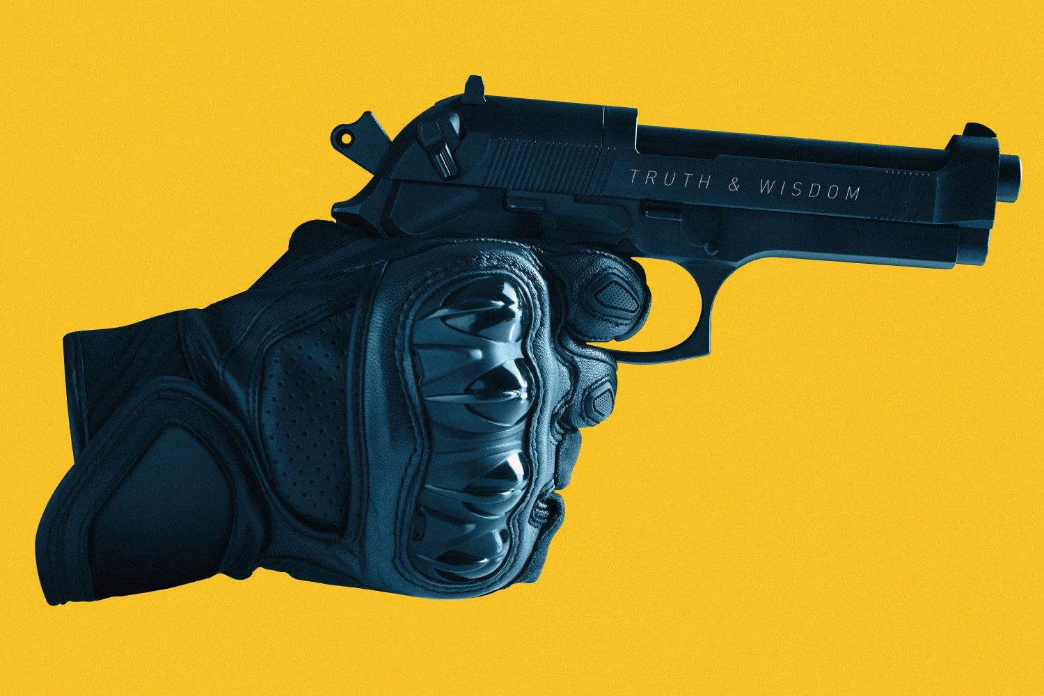 Tactical gloved hand holding a black handgun with Truth and Wisdom engraved on the slide against a yellow background.