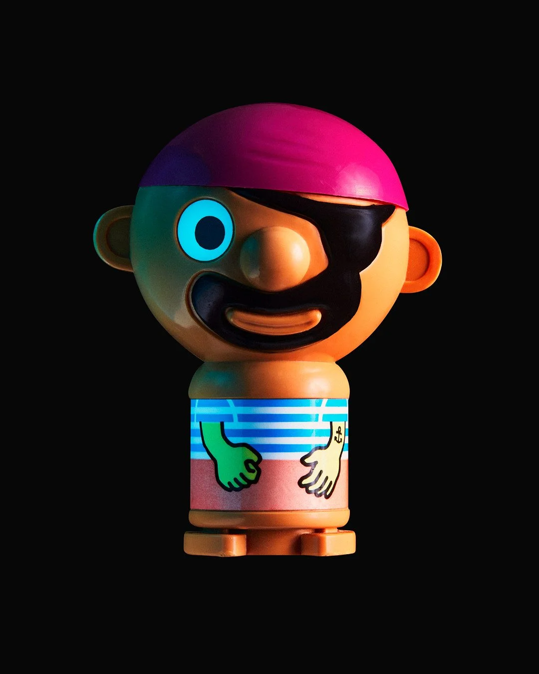 Stylised pirate toy figure with pink bandana, eye patch, and striped shirt against a black background.