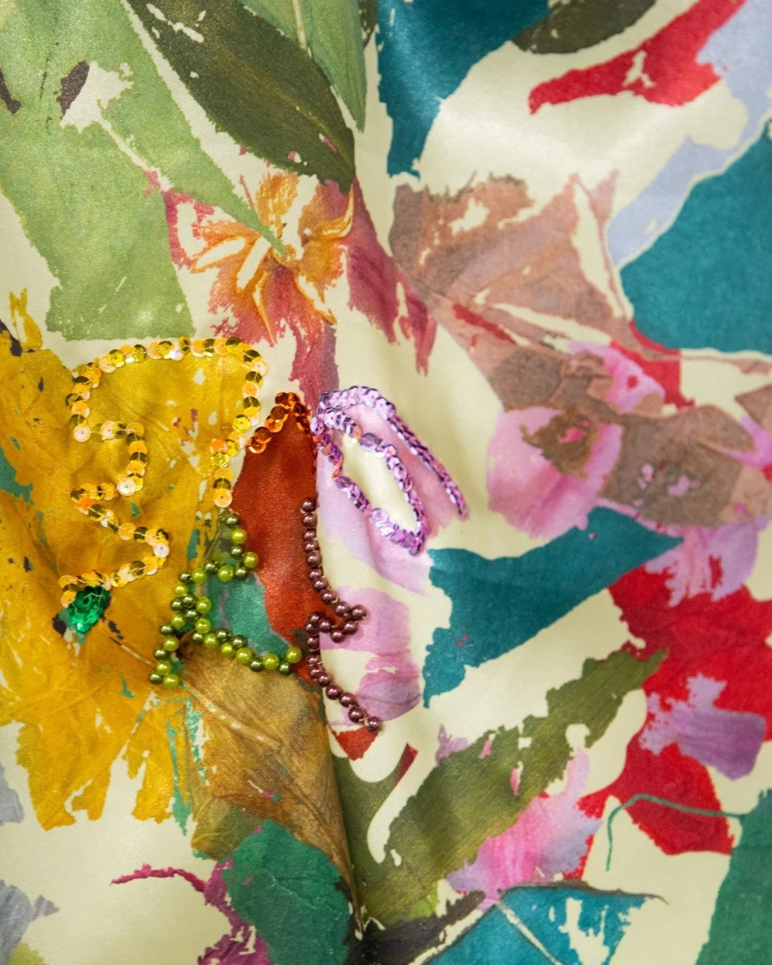 If the cold, grey weather is bringing you down - our current exhibition 'Threads of Home' may be just what you need 💐

Exploring the details of the exhibited pieces, sparking sequins and the vibrant hues of summer flora promises Spring and Summer's 