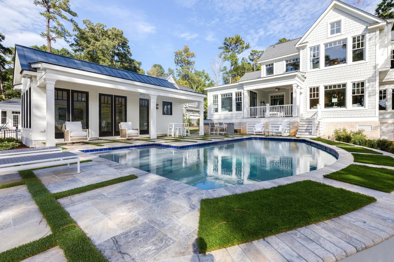 Luxury backyard pool at twilight