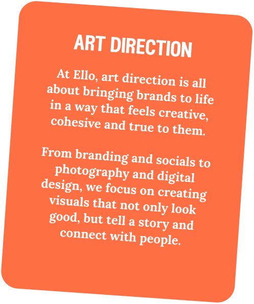 Orange sign with white text about art direction and creating visual stories