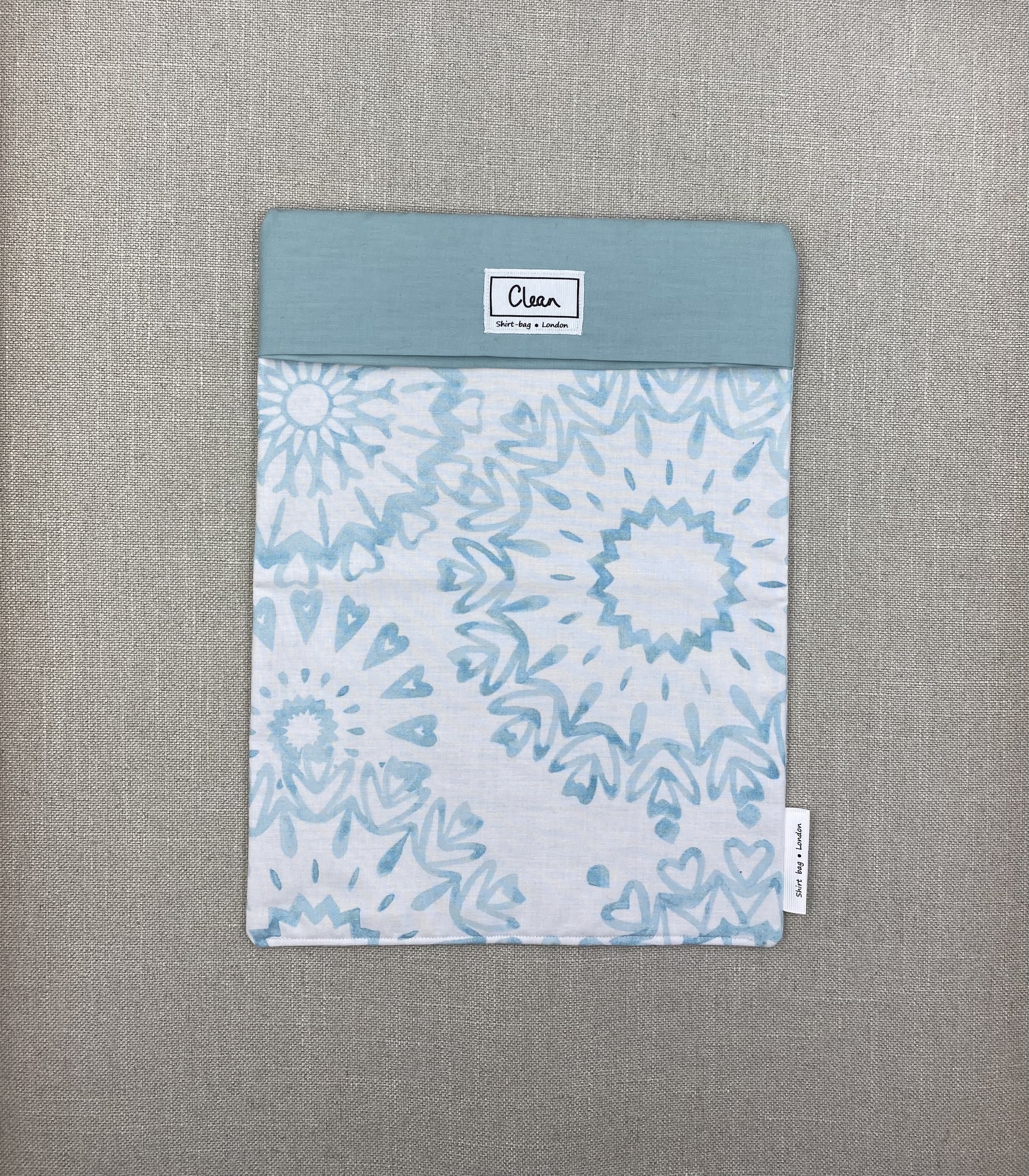 Aqua flower on white with blue top - X large.jpeg