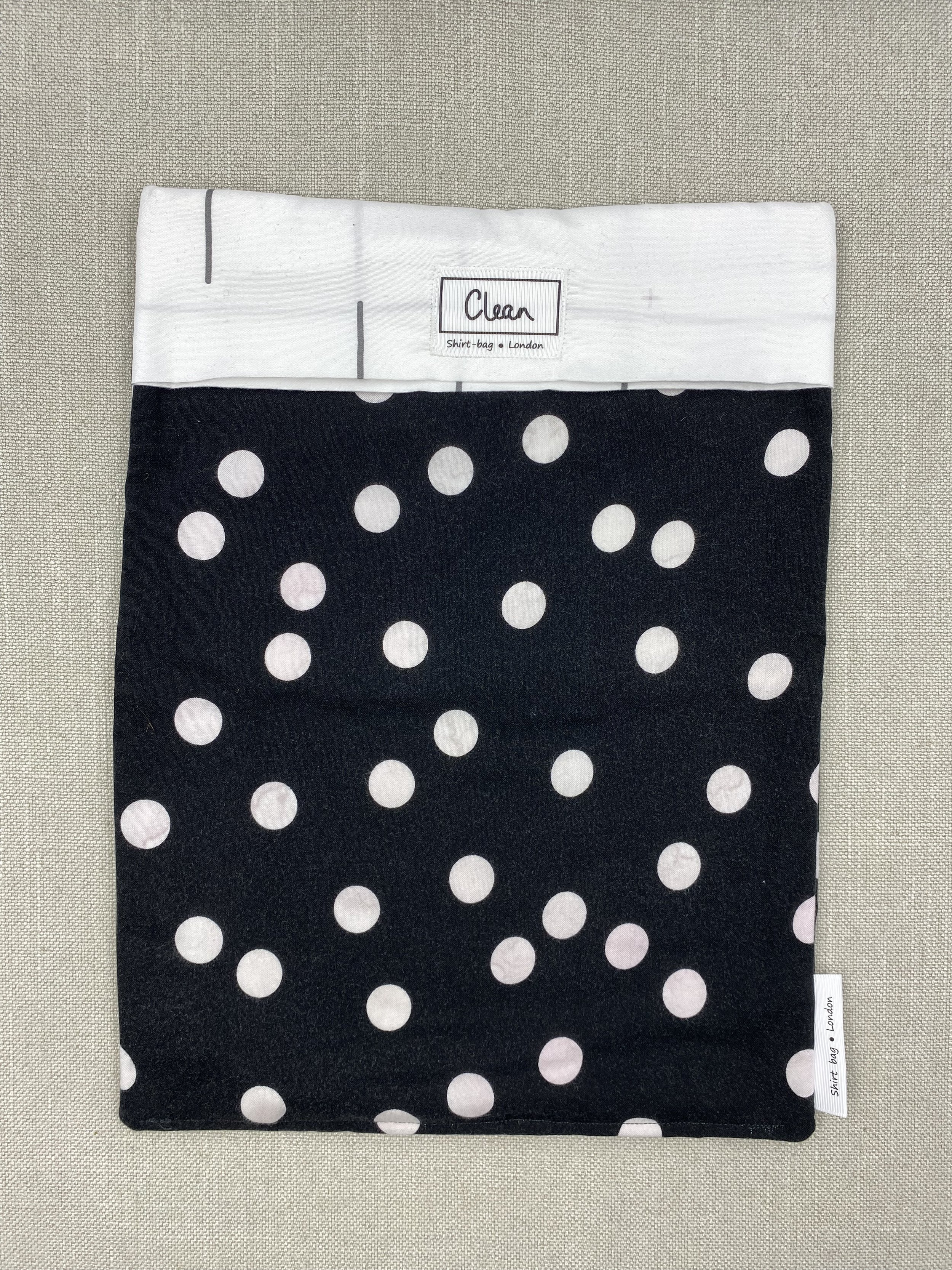 Black with white spots and white top - X large.jpeg