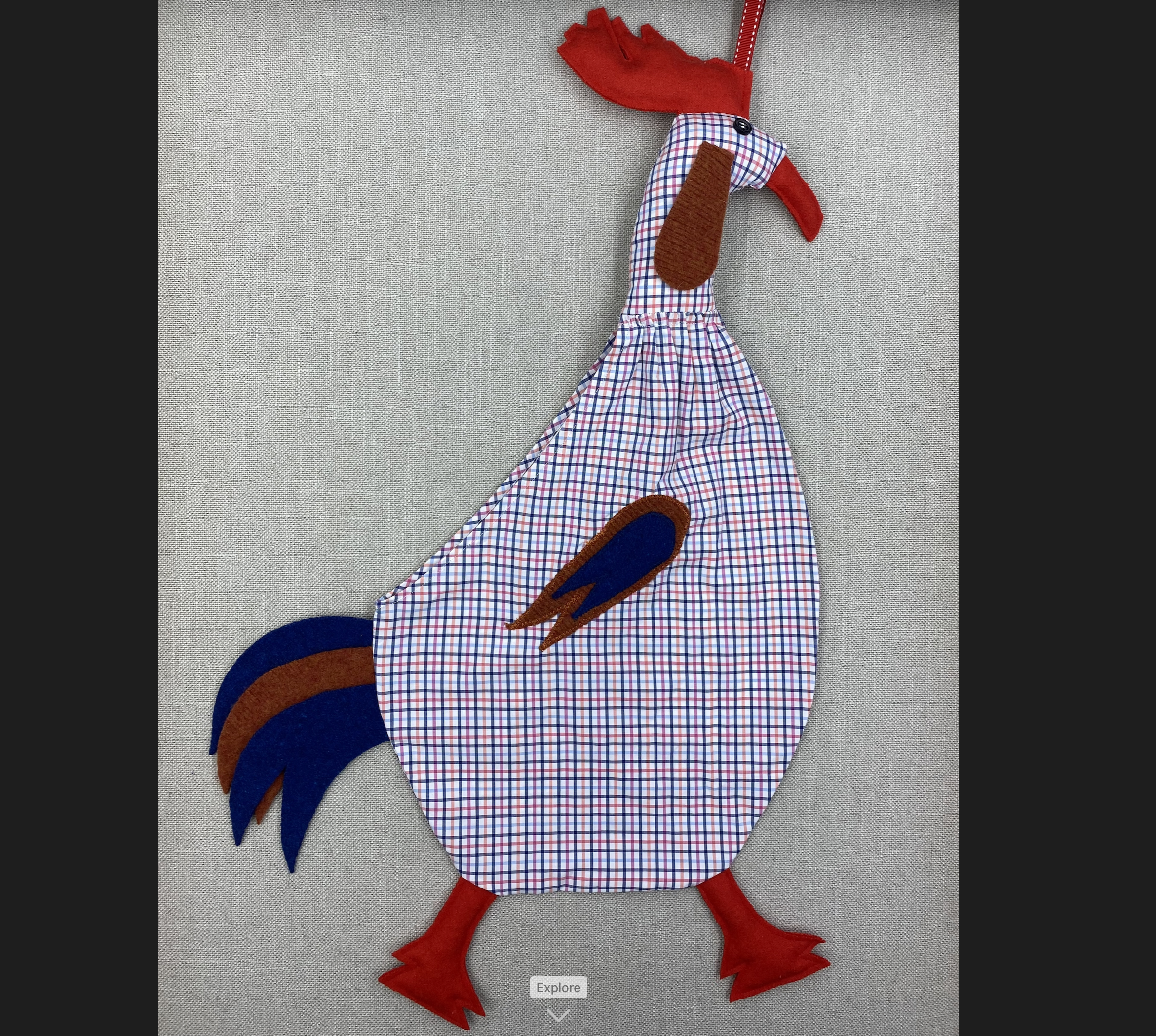 Orange, grey & blue check with red, blue and orange.png
